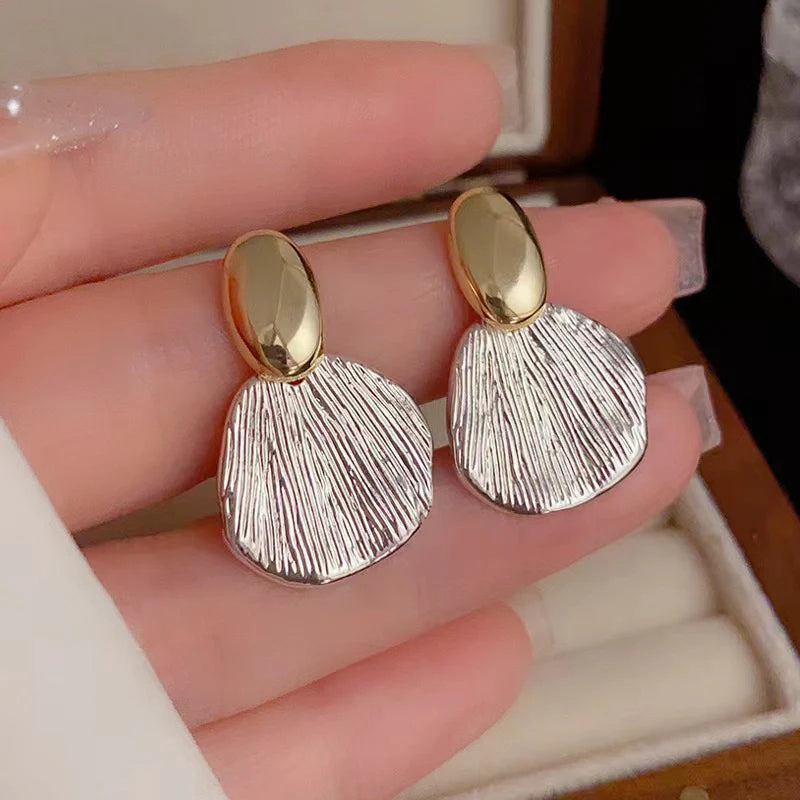 The Shringar Golden Seashell Statement Earrings
