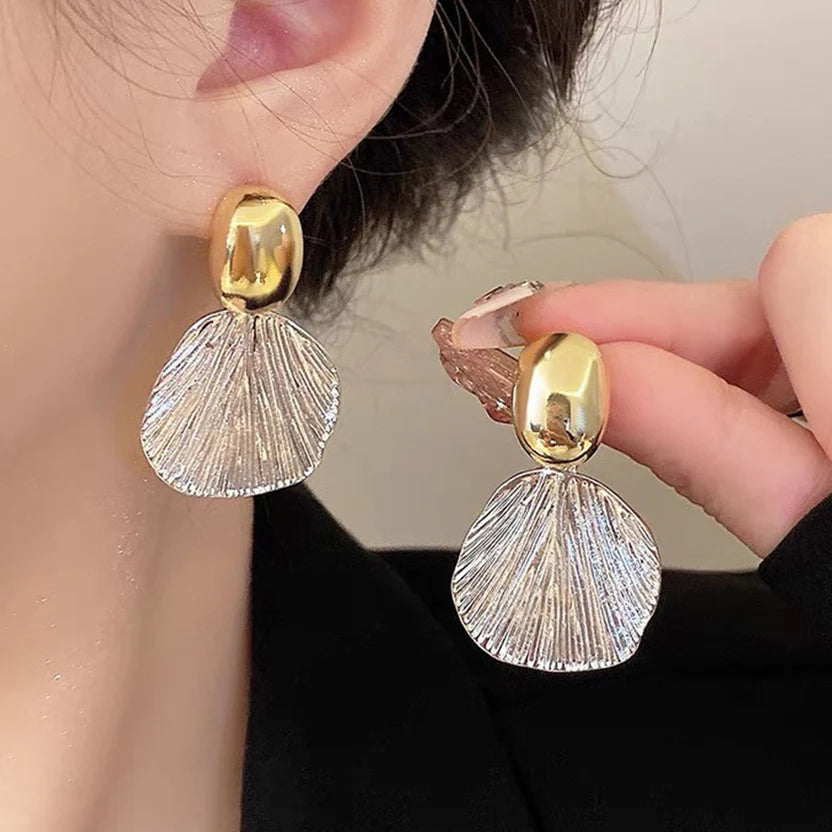 The Shringar Golden Seashell Statement Earrings